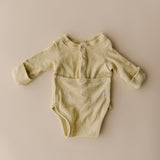 Terry Front flap Onesie | Buttercream