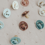 Itzy Soother™ Natural Rubber Paci Sets: Coconut + Toast 0-6M